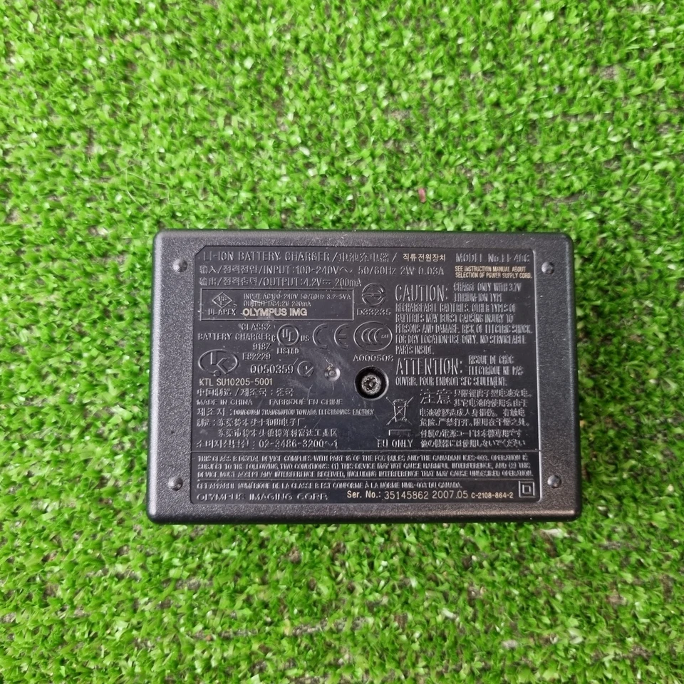 Cargador de batería de iones de litio genuino para cámara Olympus LI-40C L1-40B Foto 2 de 3