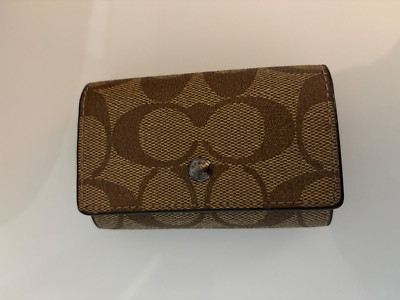 Coach Women s Key Case Brown Signature and Black Interior. Button needs repair