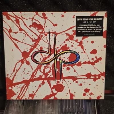 Devin Townsend Project - Addicted Original CD + DRUMSTICK from 2010 (Hellfest)