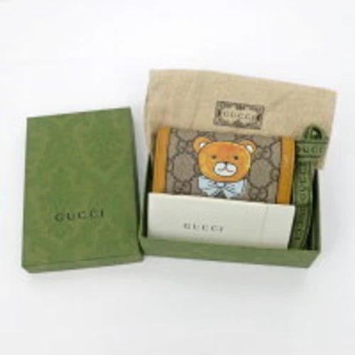 Gucci Portefeuille Bifold GG Supreme 660510 EXO Kai Collaboration Luxe Marron Toile