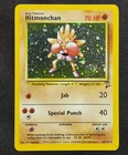 Hitmonchan 8/130 Base Set 2 Holo Rare  Swirl Pokemon Card LP