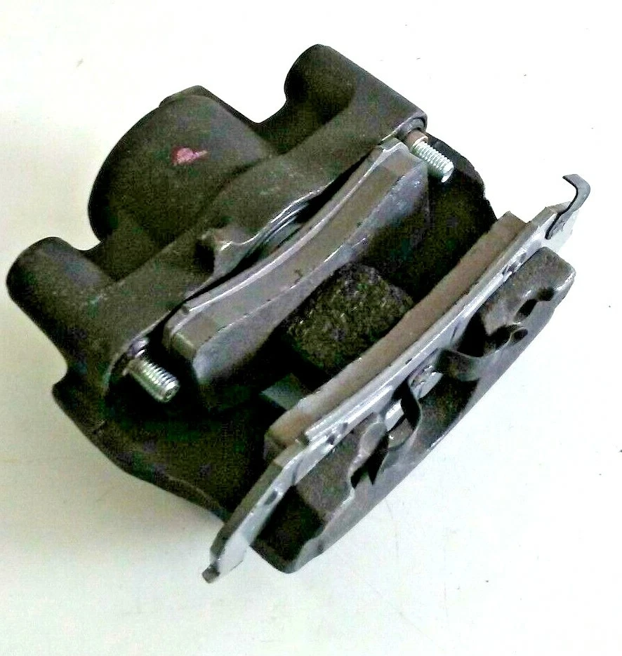 Pinza de freno de disco con pastillas de freno semimetálicas delanteras derecha WAGNER TQM25057 Reman Foto 2 de 4