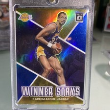 2022-23 Optic Kareem Abdul-Jabbar Winner Stays Color Match Gold Purple Prizm /85
