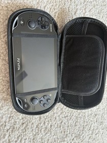 Sony PS Vita PCH-1001 Console with Games, Charger, Carrying Case & Accessories