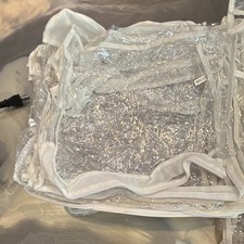 24 total clear rectangular and 30 no zip dome storage containers.
