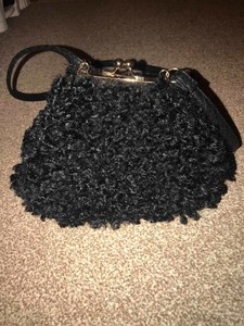 black fluffy handbag