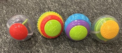 BRIGHT STARTS SHAKE & SPIN ACTIVITY BALLS~SET OF 4~SENSORY RATTLES BABY TOY
