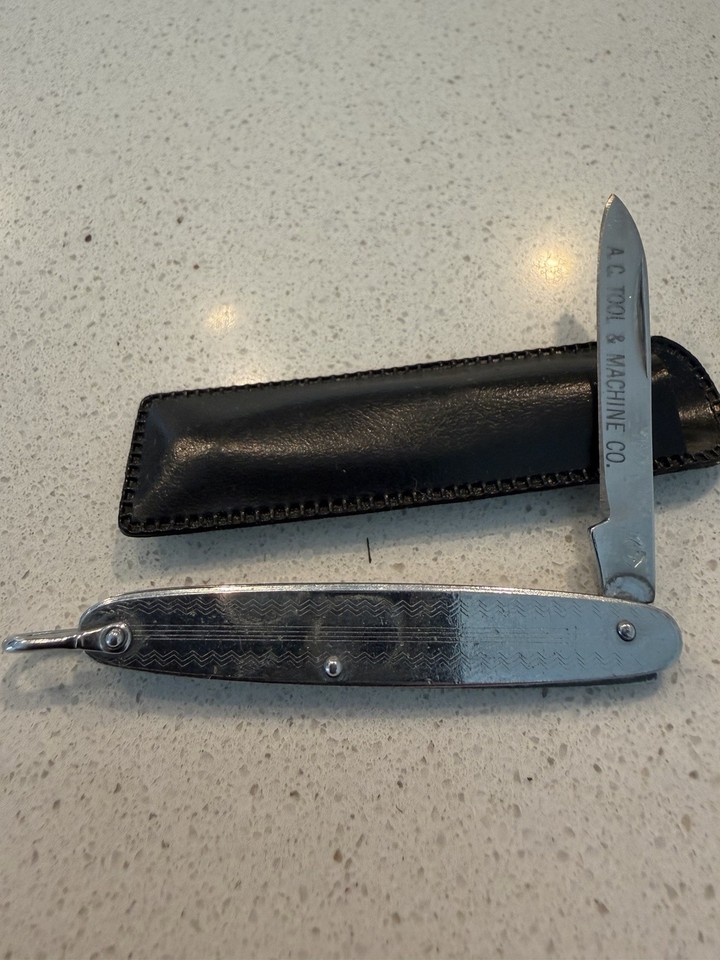 Tiny advertising pocket knife from AC Tool & Machine Co. — a miniature slice of American industrial history you can carry in your pocket.