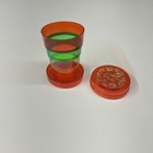 VINTAGE MULTICOLORED COLLAPSIBLE DRINKING CUP MADE IN HONG KONG