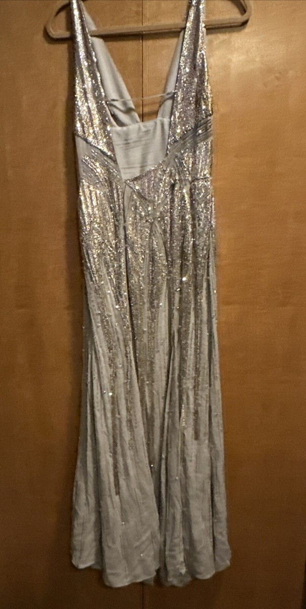 1999 versace dress silver Kylie Jenner wore a vintage silver chainmail Atelier Versace dress from the Spring 1999 collection. (Photo: Getty)