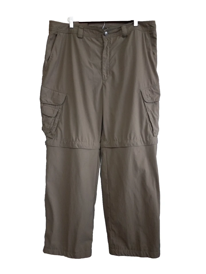 Pantalones cargo Under Armour ajuste regular 38X30 marrón varios bolsillos cremallera desmontables Foto 4 de 4