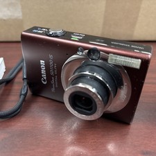 Canon PowerShot ELPH SD1100 Is Digital Camera Burgundy. Battery Charger Case Inc