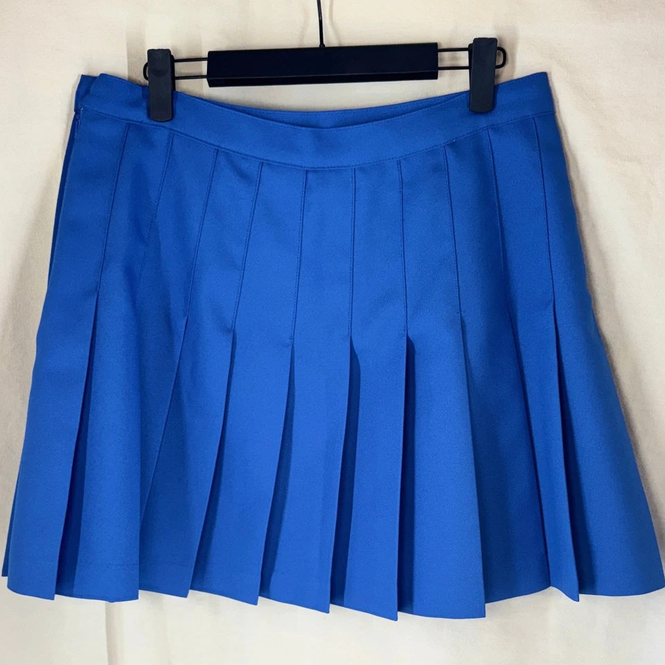 Falda deportiva plisada Reebok para mujer talla 14 azul tenis golf Skort años 90 Y2K usada en excelente estado Foto 3 de 4