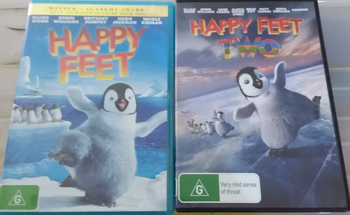 DVDS - HAPPY FEET AND HAPPY FEET TWO PACK - GOOD CONDITION