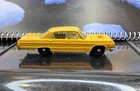 Lesney Matchbox 20c; Chevrolet Impala Taxi; Dk Yellow, Silver Base, White Seats