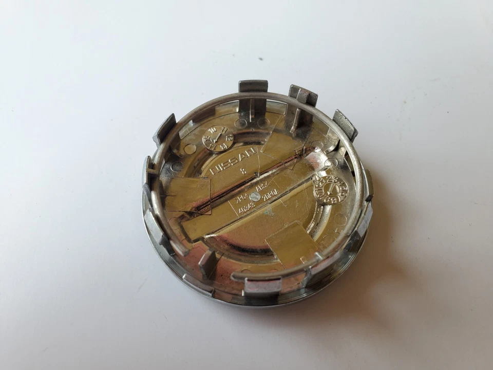 CUBIERTA CENTRAL TAPACUBOS LLANTA NISSAN CUBE JUKE SENTRA NV200 MURANO QUEST ROGUE Foto 3 de 4