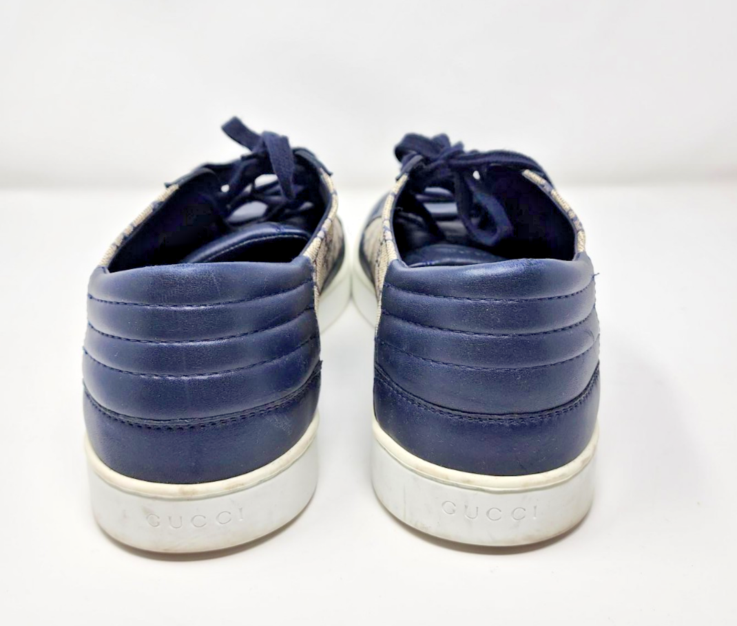 Gucci GG Supreme Monogram low-top sneakers in a midnight blue and