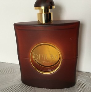 opium eau de toilette spray 3 oz