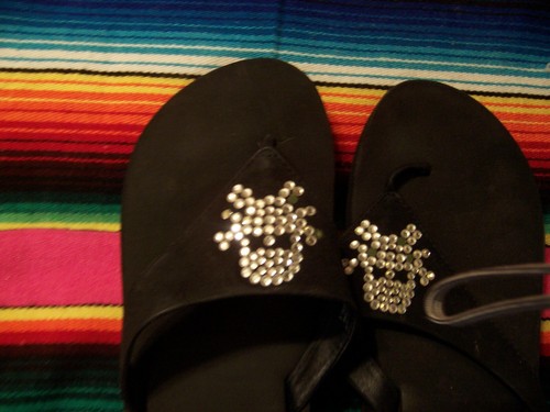 yellow box skull flip flops