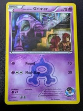 Team Aqua's Grimer 7/34 Double Crisis Regular LP