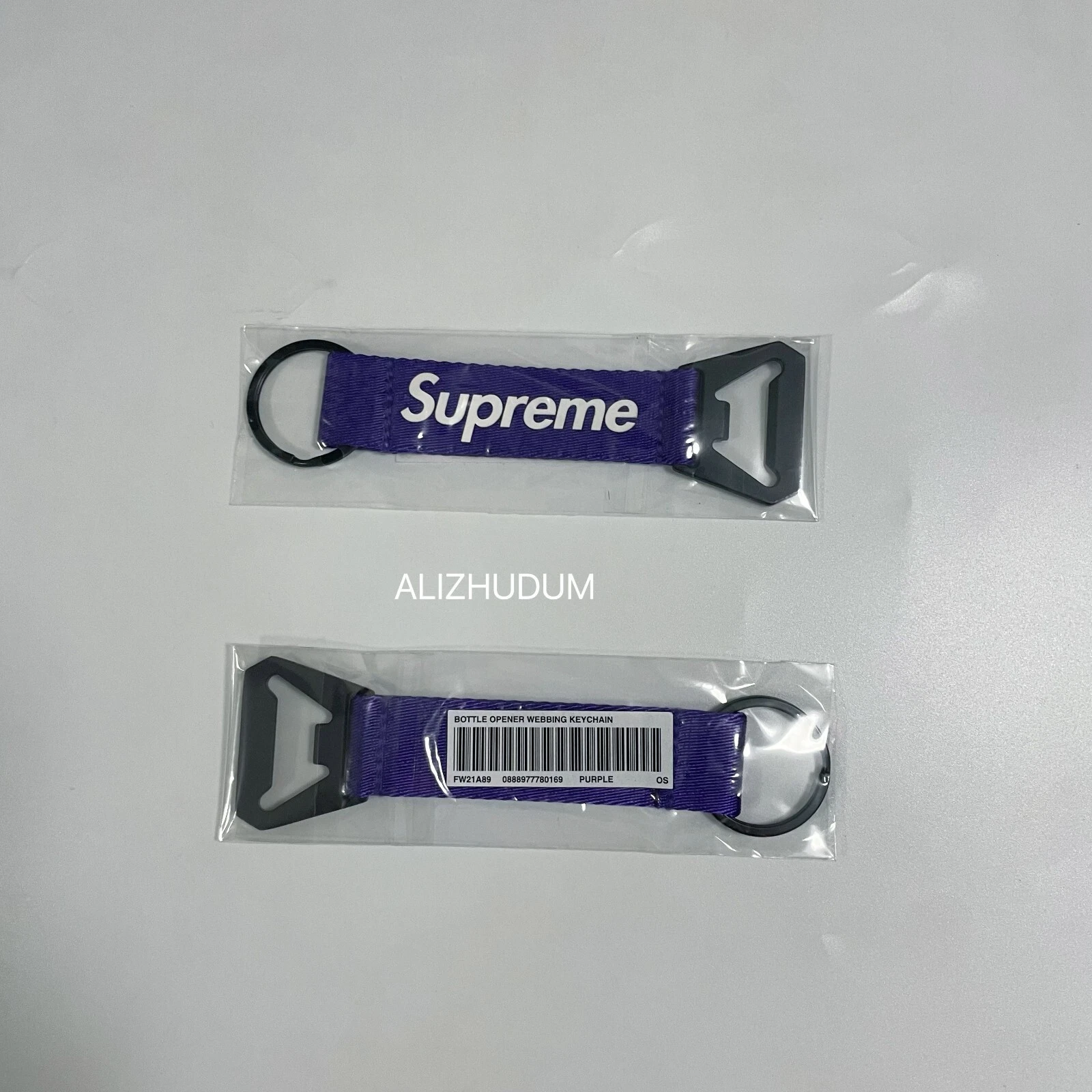 PORTE CLÉS SUPREME FW21 OUVRE BOUTEILLE SANGLE VIOLET FLAMBANT NEUF