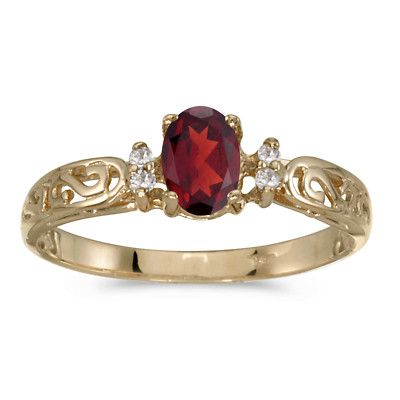 Filigraner Ring 14 Karat Gelbgold ovaler Granat und Diamant