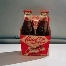4 Pack of 2012 Coca-Cola Coke Christmas Santa Claus Holiday Full Bottles
