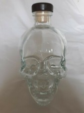 skull head glass bottle