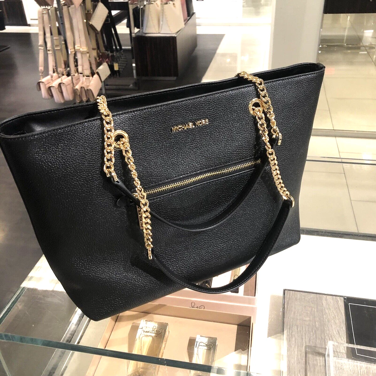 Michael kors purse with mk sales on it