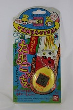 Bandai New Species Tamagotchi Yellow Pocket Game Raising Game Japan Made in 1997