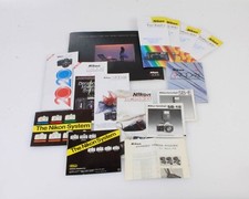 ASSORTED NIKON MANUALS, SET OF 14