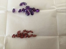 Loose Semi Precious Stones. Lot.12 Amethyst 6mm RND . 16 Garnets 6x3 Marqu. Cut