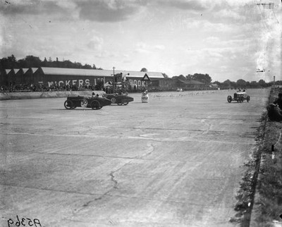 Alf E Depper Austin battles with A A E Grey Austin at the hairpin - Old Photo