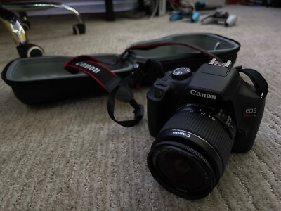 Canon Rebel EOS T7 with 18-55 mm lens and camera case