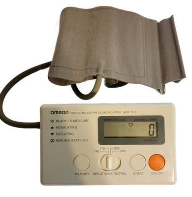 Omron Blood Pressure Monitor-Model HEM-712C- Complete With Manual