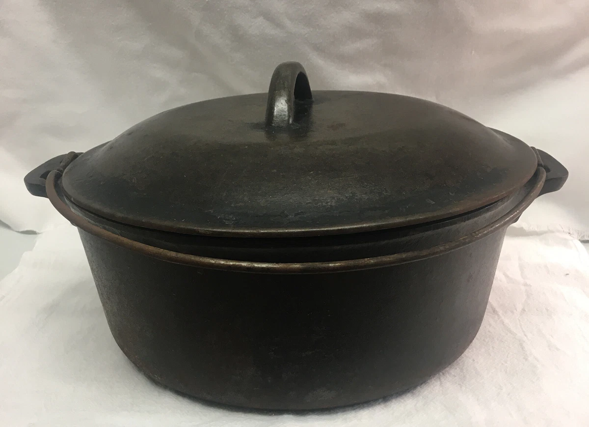 Vintage Griswold Cast Iron Dutch Oven With Handle! Small crack