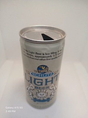 2 vintage schlitz light empty cans