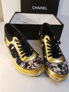 black and gold chanel sneakers