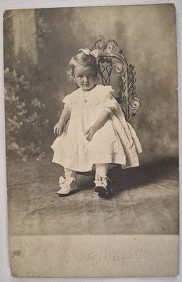 Vintage Postcard RPPC Crazy Eyed Cute Toddler Girl Dress Bow   AA98