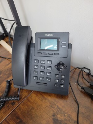 Yealink SIP-T31P Entry-Level IP Phone with 2 Lines and HD voice - Black