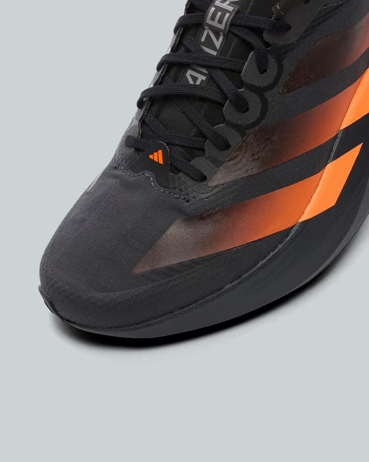 adidas ADIZERO EVO SL Trainers in Carbon / Black Lucid Orange