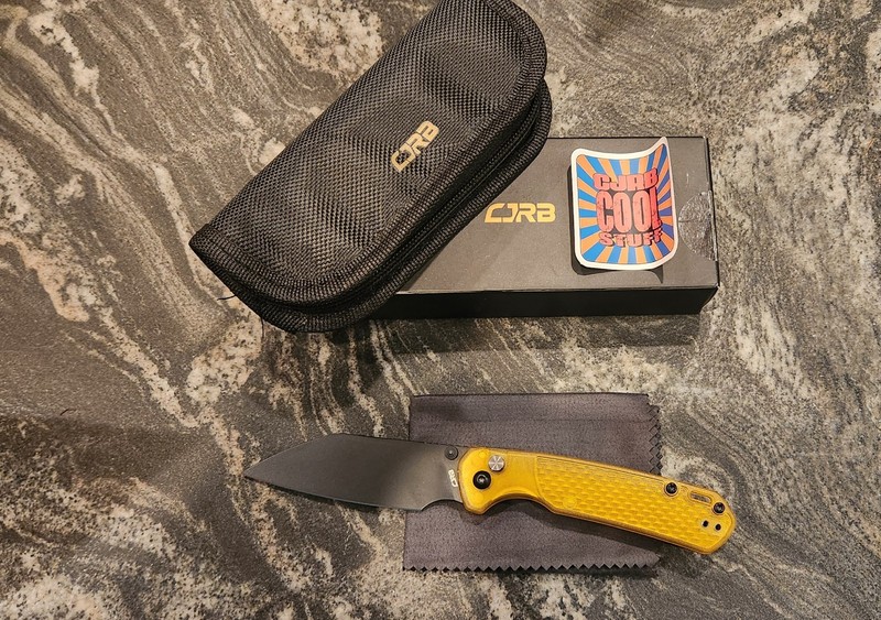 CJRB Pyrite Light Folding Knife Amber FRN Handle AR-RPM9 Wharncliffe J1945-AMB