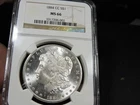 1884-CC Morgan Silver Dollar - NGC MS66 - Beautiful PQ Example with clean cheek