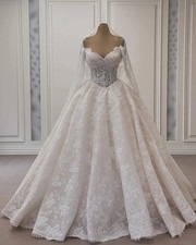 A-Line Wedding Dresses Lace Long Sleeves Wedding Gowns Sequins Beads Sweep Train