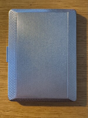 Han-Bro Made in England vintage silver coloured cigarette case. 8 x 11 cms. 