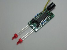 DISPOSITIVO LAMPEGGIATORE ASINCRONO DI CODA PER SISTEMI DC E DCC 