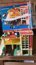 This is the vintage Fisher-Price Play Family Action Garage toy, model #930