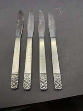 Set Of 4 St. Regis Stainless Steel Dinner Knives With Floral Handle Design
