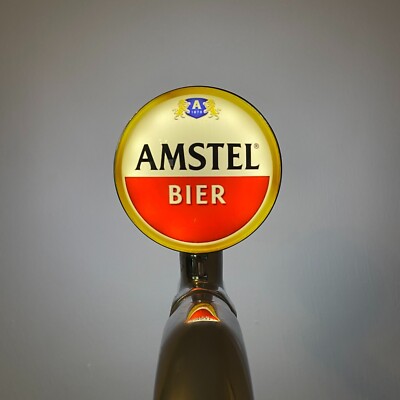 Nagelneues Amstel Bier Abzeichen! Amstel Bierglas! Amstel Pumpenabzeichen! Froschaugenlinse