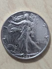 1946 Uncirculated 90% Silver Walking Liberty half.